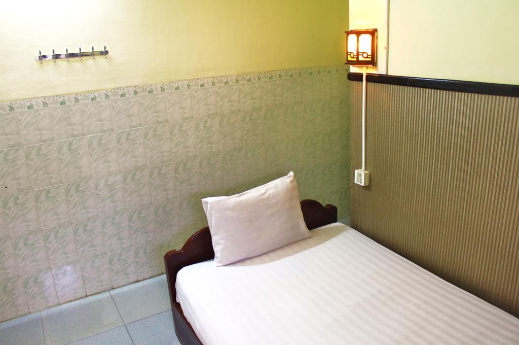 Tt Guesthouse Phnom Penh Habitación foto